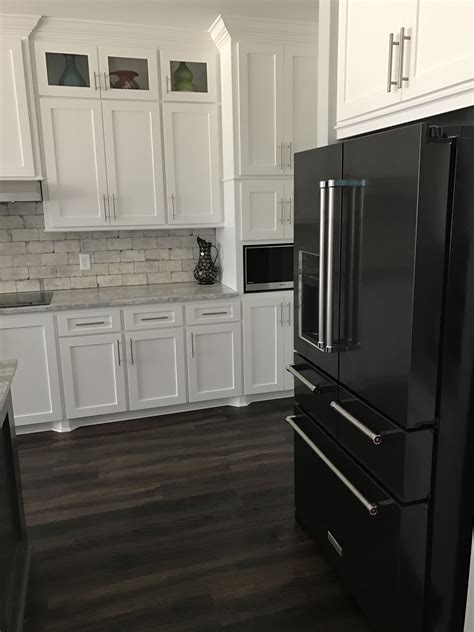 dark gray kitchen cabinets with stainless steel appliances|appliances with white cabinets.